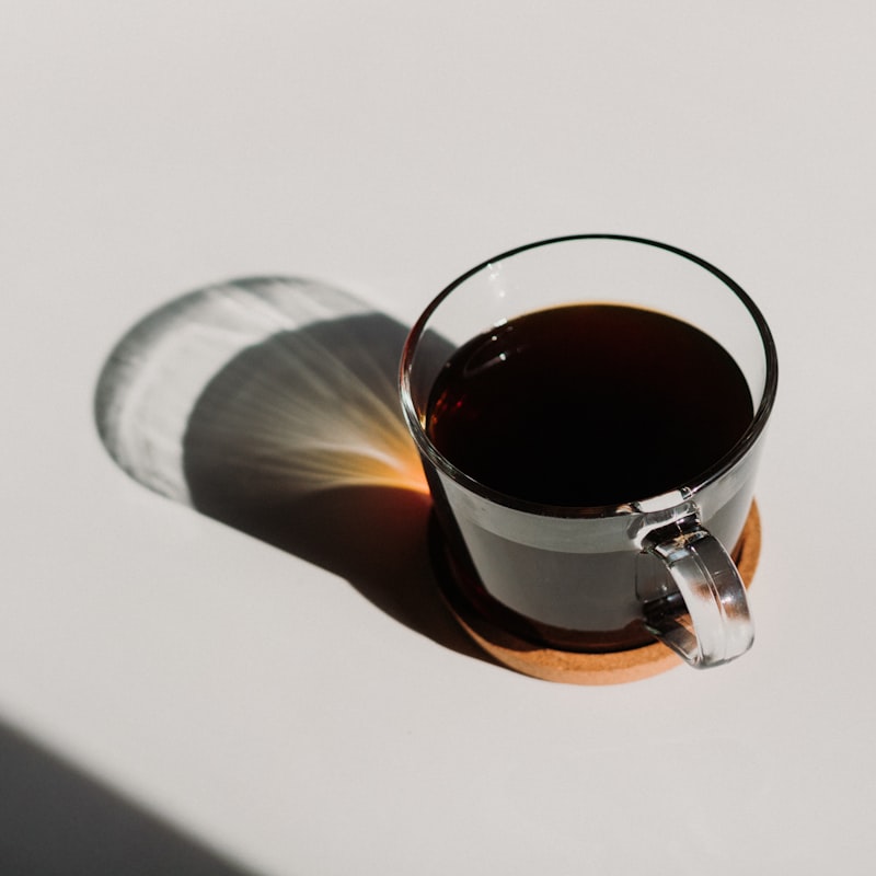 A quiet cup of black coffee in the afternoon light